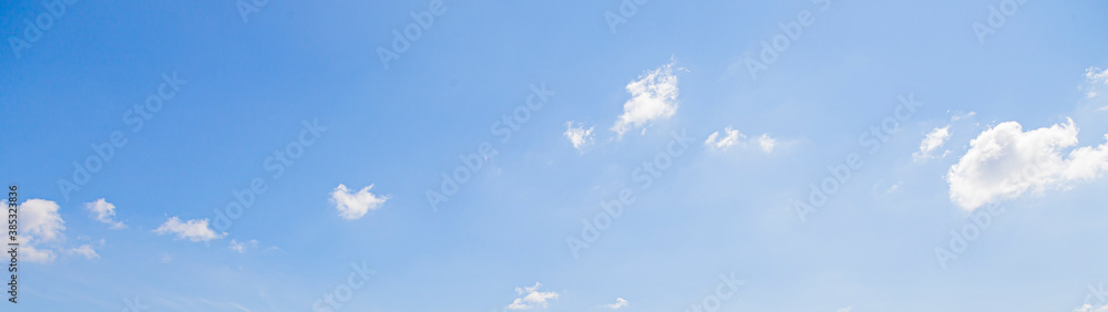 Image of a partly cloudy and partly clear sky during the day Image of a partly cloudy and partly clear sky during the day