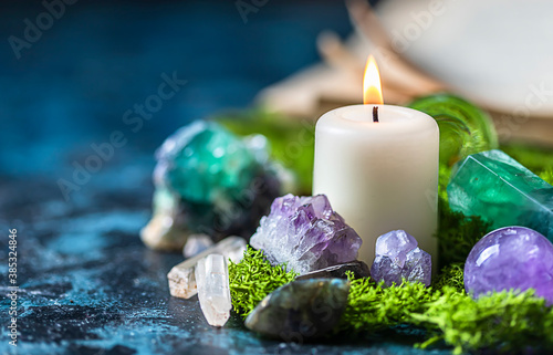 Obraz na plátně Crystalline minerals for meditation, candle, moss, book
