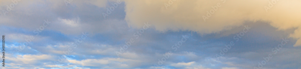 Image of a partly cloudy and partly clear sky during the day Image of a partly cloudy and partly clear sky during the day