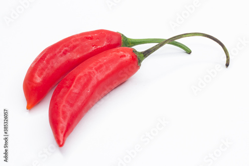 Two peppers on the table.