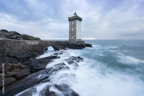 Beautiful Kermorvan lighthouse, most western part of France, Le Conquet, Bretagne, France Stormy weather in coastline.