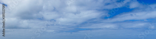 Image of a partly cloudy and partly clear sky during the day
