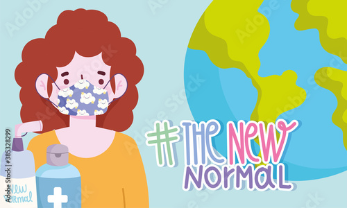 new normal lifestyle, girl with funny mask world and sanitize hands products