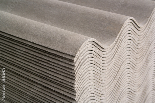 wave asbestos-cement slates stacked for use in home construction.