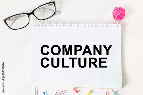 Notepad with inscriptions COMPANY CULTURE on a white background. business concept.