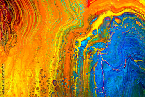 Colorful Acrylic pouring art painting on canvas. Creative and wallpaper concept.