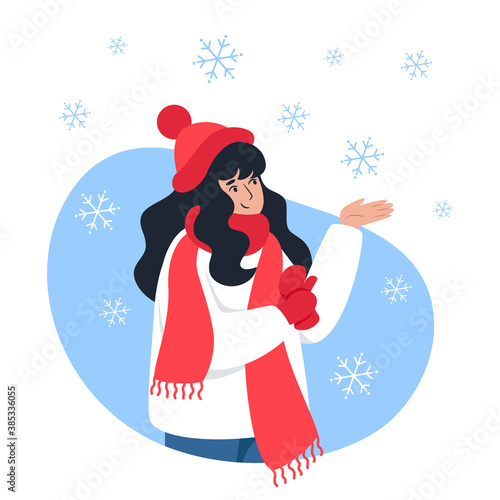 Woman catches snowflakes with her hand, winter walk, Christmas mood. Vector illustration for a greeting card and web design of sites and pages