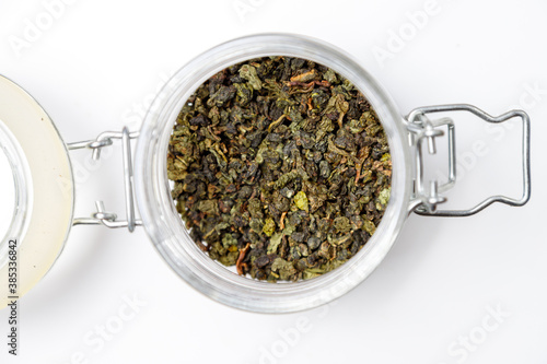 Tieguanyin (Tie guan yin) in a glass jar photo