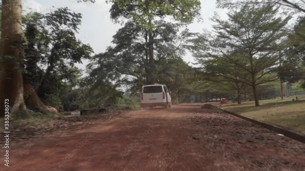 Aerial shot of a van in the middle of the jungle. Aerial shot of a van in the middle of the jungle.