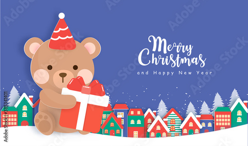 Christmas greeting card with cute teddy bear in paper cut style.