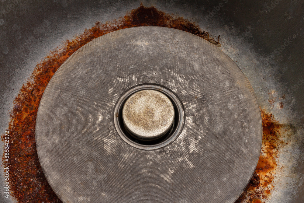 Rusty surface of an open empty multicooker. Maintenance and service for kitchen appliances
