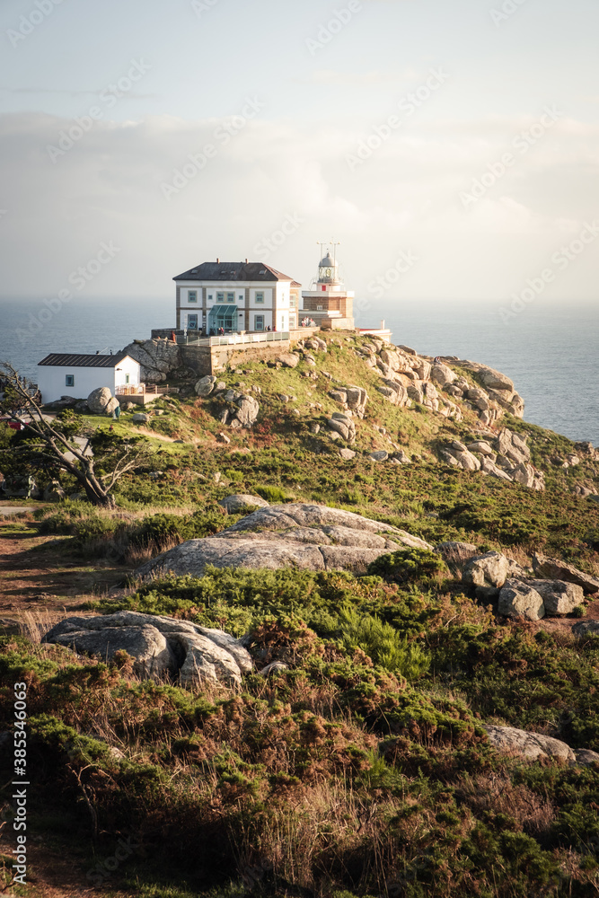 Views of Finisterre lighthouse from the cliff at the end of the world.