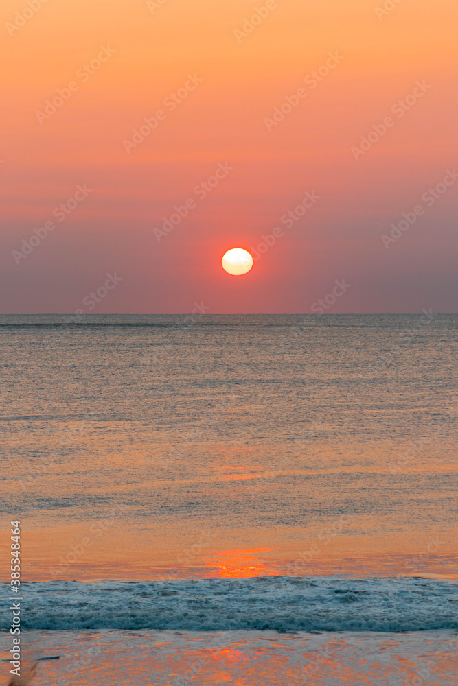 Sunrise on a east coast beach in Ocean City Maryland