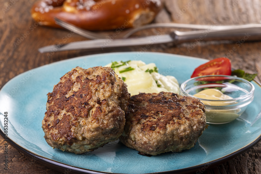 two bavarian meat loafs on a plate