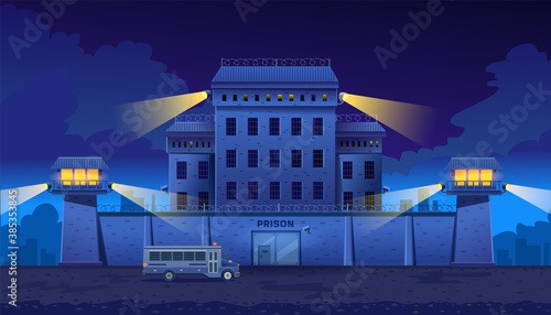 Guarded city prison building at night with two watchtowers on a high brick fence with barbed wire, bus for transporting prisoners. The prison has steel gates and surveillance cameras. Vector 