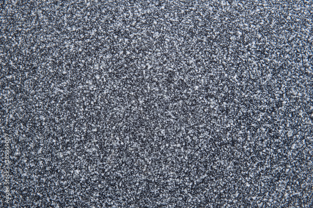 Beautiful abstract background. Granite black and white tiles. A decorative background with an interesting bubble structure. Construction concept. Beautiful abstract background. Granite black and white tiles. A decorative background with an interesting bubble structure. Construction concept.