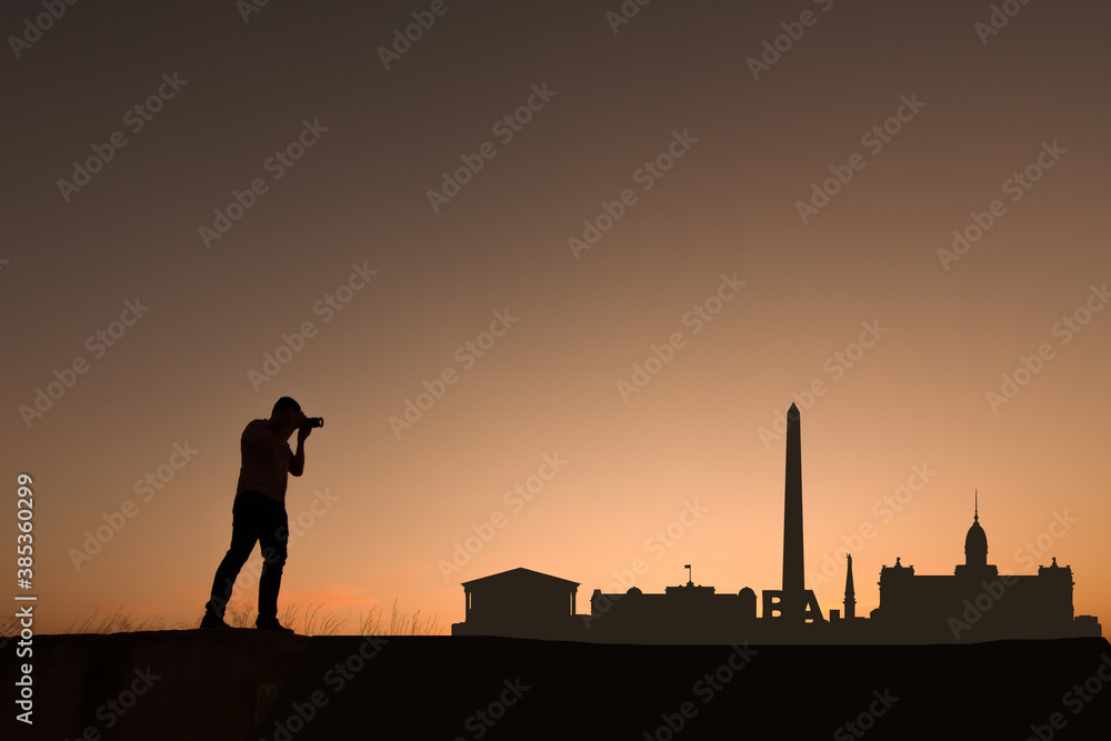 man next to Buenos Aires city skyline silhouette