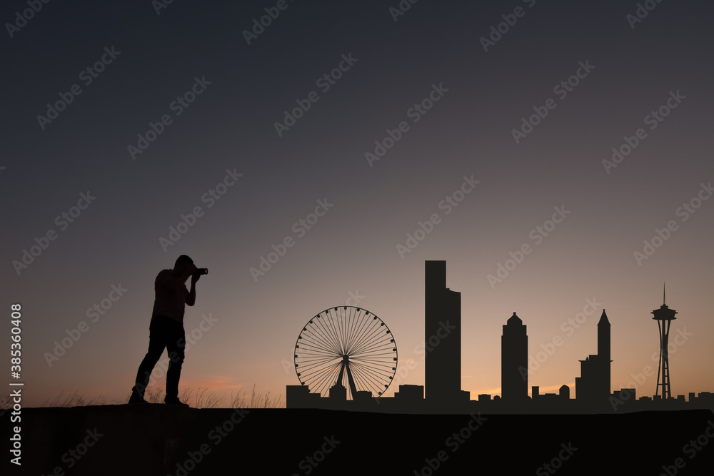 man next to seattle city skyline silhouette