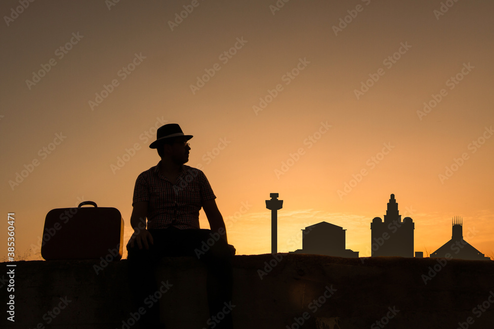 liverpool city skyline with man in front