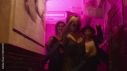 happy girls come to a club party