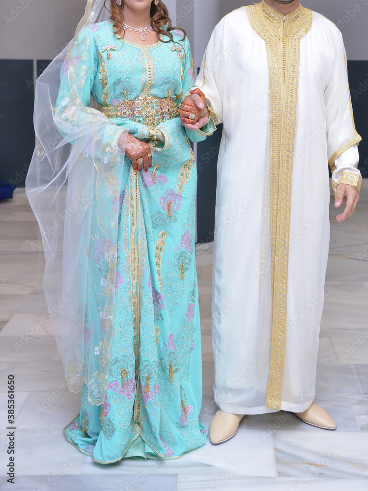 Moroccan bride and groom. They wear traditional wedding dress. Moroccan wedding. Arab traditions