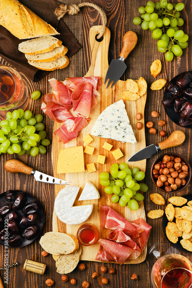 Top view of cheese plate and snack for wine