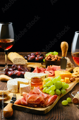 Plate with various snack for wine