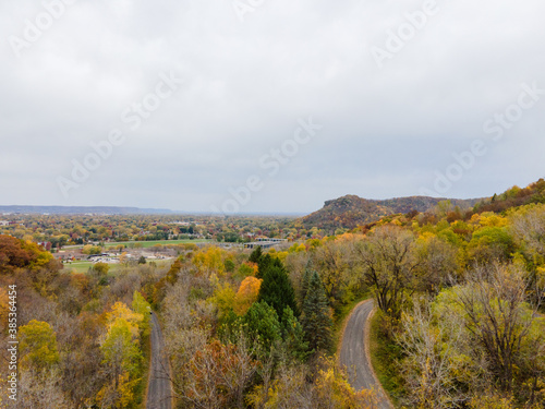 landscape with sky and clouds As the road winds through the hillside during autumn © Southport Images