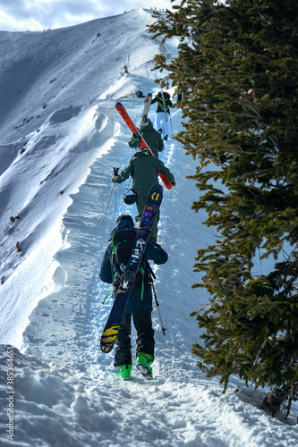 Skiers Hiking Highland Bowl - Aspen Highlands, Aspen, Colorado
