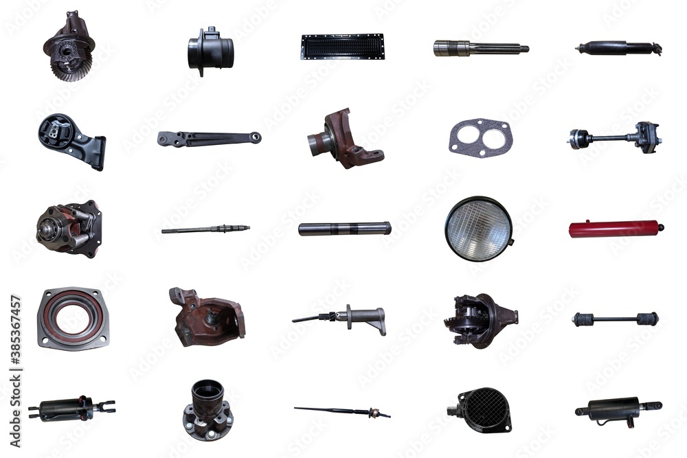 Lots of new car parts on an isolated white background. Autoshop.