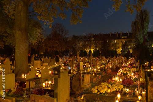 Endless grave lantern lights at cemetery in Poland