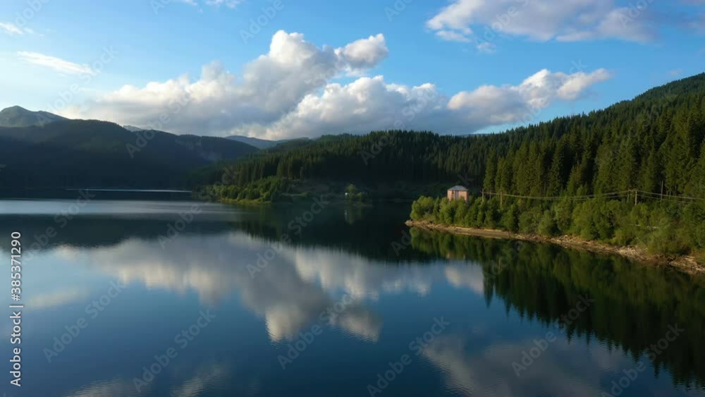 evening lake aerial panorama with the beautiful reflections and pine forest coastline
evening lake aerial panorama with the beautiful reflections and pine forest coastline