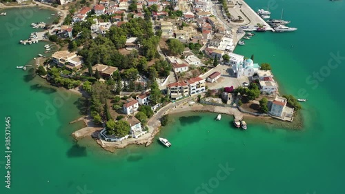 Aerial drone video of famous fjord seaside village and bay of Porto Heli in the heart of Argolida prefecture, Peloponnese, Greece photo