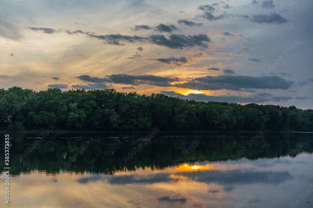 Fototapeta premium sunset over the river