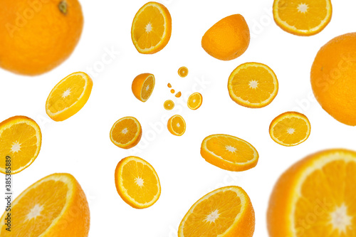 Fototapeta Naklejka Na Ścianę i Meble -  Fresh Orange falling isolated on white background. Selective focus
