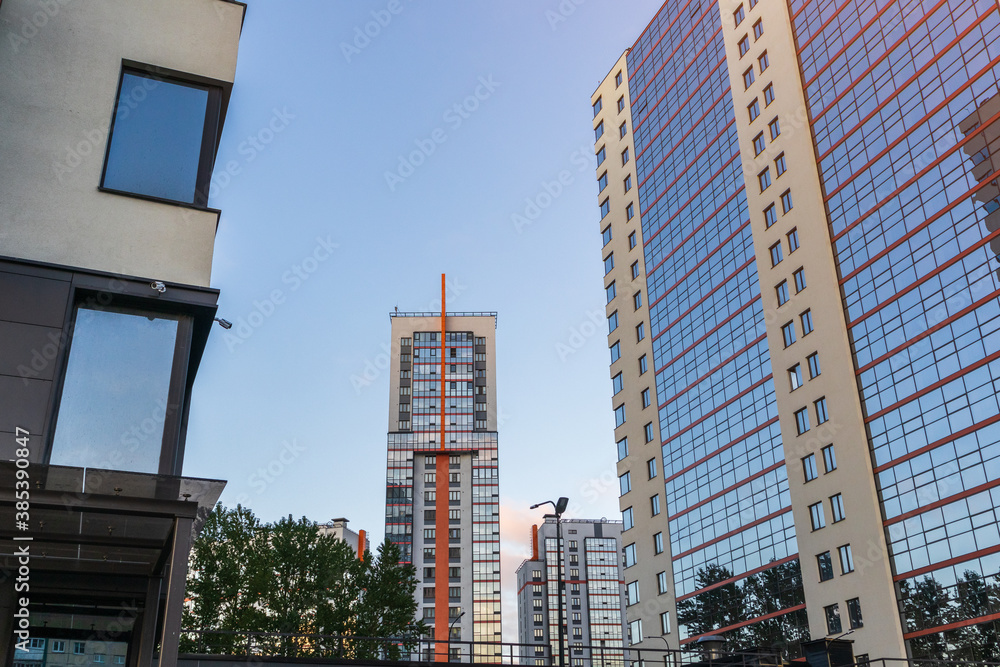 Obraz premium building in the style of modern architecture high-tech cityscape mirrored facade apartment