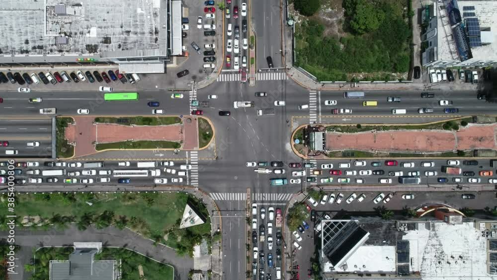 Aerial dolly in of traffic in Santo Domingo city junction. Dominican Republic Aerial dolly in of traffic in Santo Domingo city junction. Dominican Republic