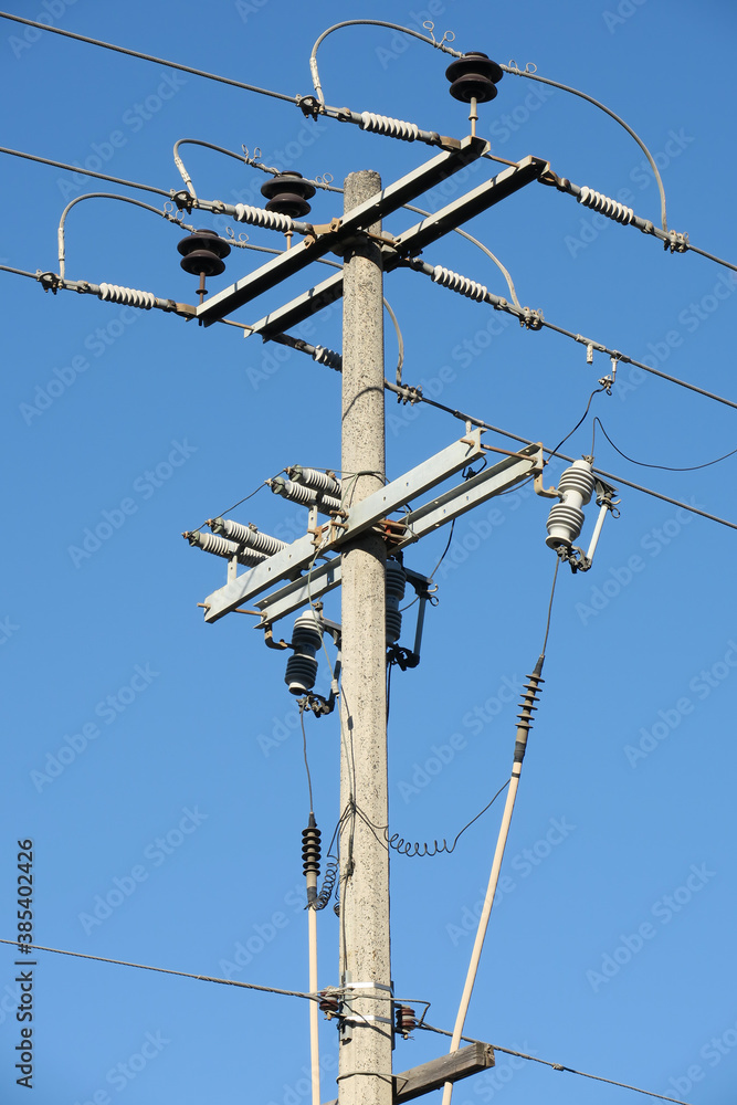 High constrast electric pole in blue sky High constrast electric pole in blue sky