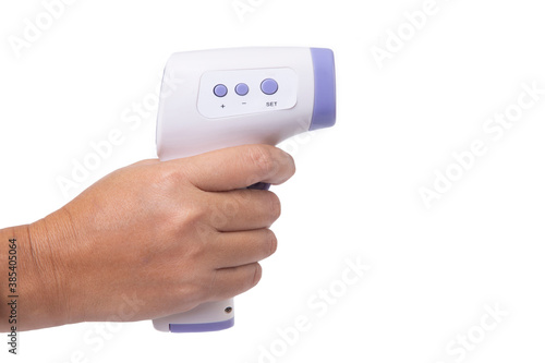 Handheld digital infrared thermometer on white background.