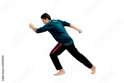 Isolated shot of a boy running isolated on white.
