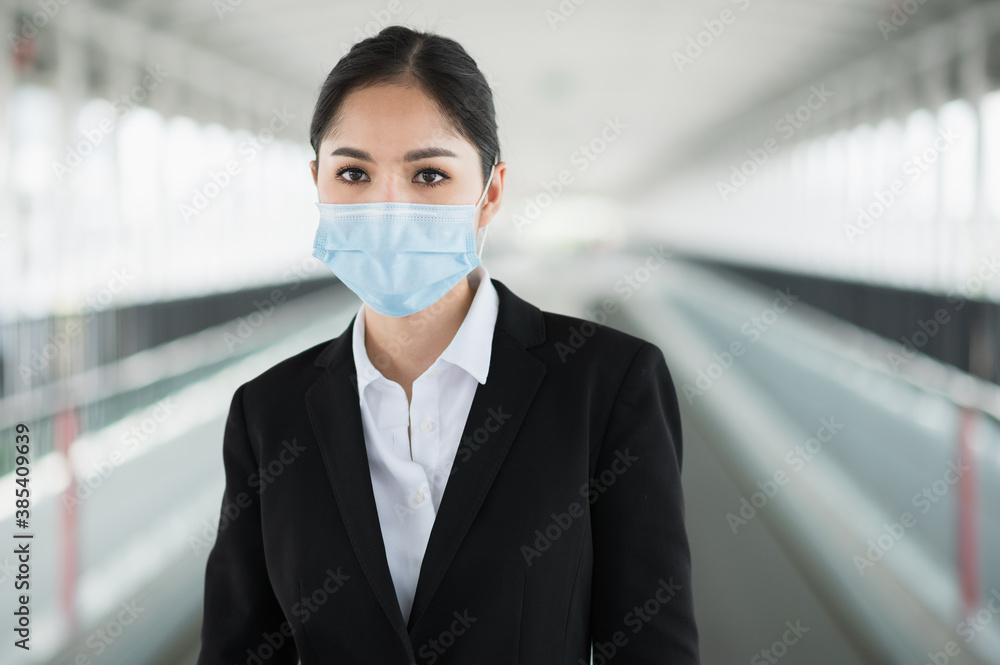 Business woman wearing protection mask. Beautiful female protective virus and pollution with face mask. Business woman wearing protection mask. Beautiful female protective virus and pollution with face mask.