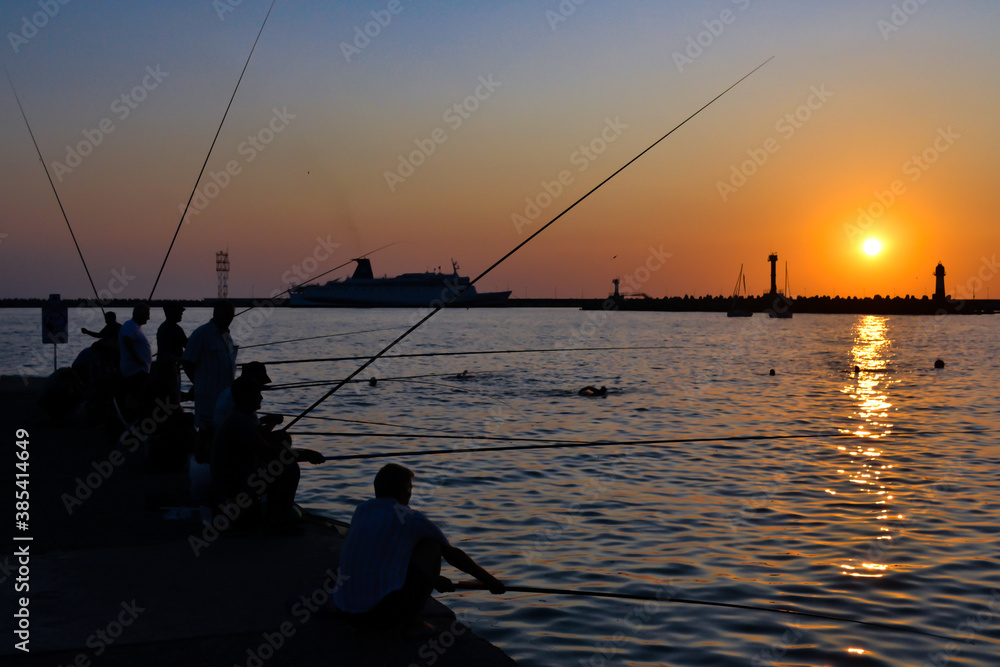 Fisherfolk. Embankment of the city of Sochi