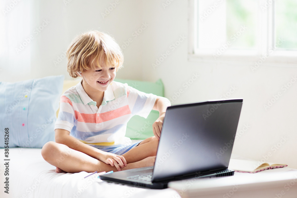 Online remote learning. School kids with computer. Online remote learning. School kids with computer.