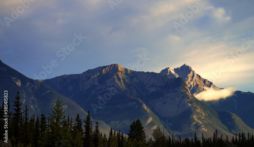 Alberta, Canada - Mountain Peaks looming over Snaring Overflow Campground