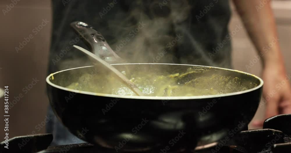 Steam Coming From The Sauce Pan With Thick Sauce For Pasta. - close up shot Steam Coming From The Sauce Pan With Thick Sauce For Pasta. - close up shot