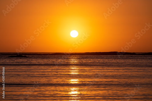 Fototapeta Naklejka Na Ścianę i Meble -  Sunset over Pacific Ocean viewed from Sunset Bay, Oregon Coast.