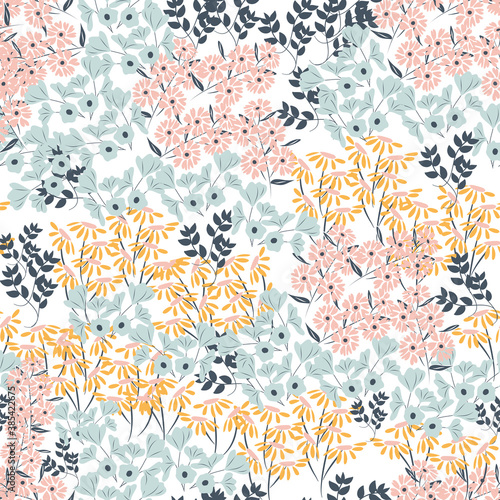 Blooming midsummer meadow seamless pattern. Plant background for fashion, wallpapers, print. A lot of different flowers on the field. Liberty style millefleurs. 