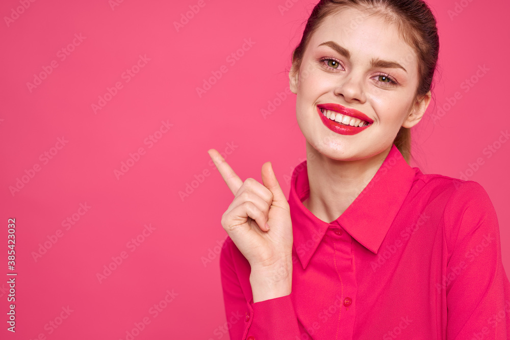 attractive girl in pink shirt cropped view bright makeup red lips gesturing with hands Copy Space attractive girl in pink shirt cropped view bright makeup red lips gesturing with hands Copy Space
