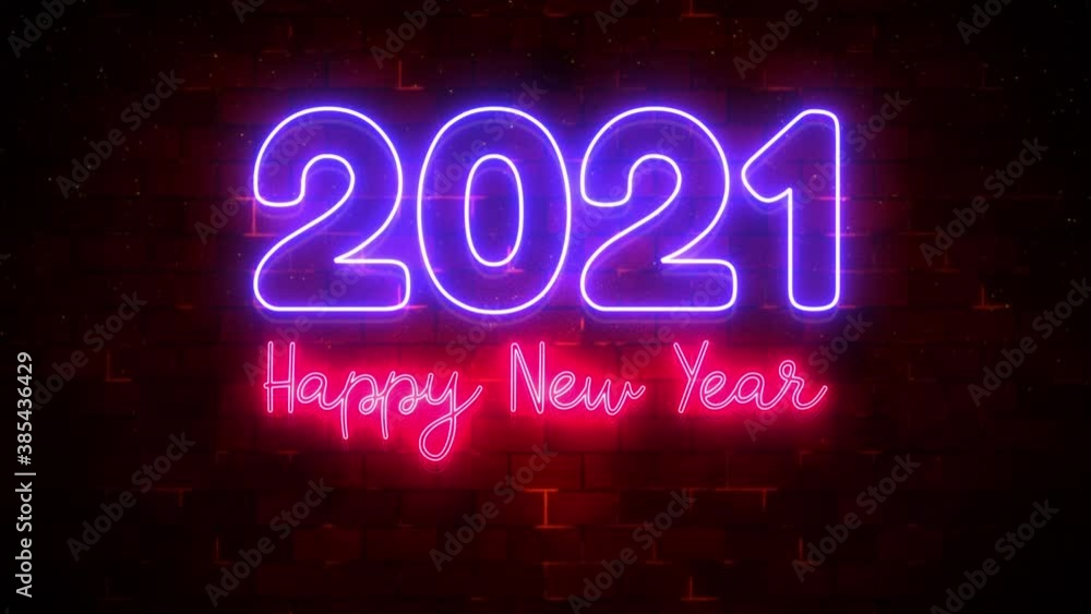 Happy New Year 2021 neon light and particle flow and brick wall decoration, Holiday and celebration background concept. Happy New Year 2021 neon light and particle flow and brick wall decoration, Holiday and celebration background concept.