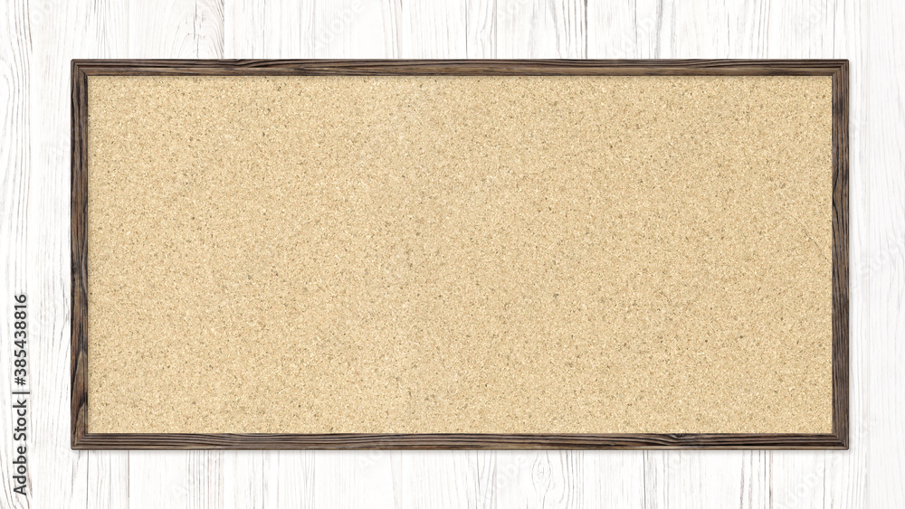 Fototapeta premium Cork board hung on a white wooden wall
